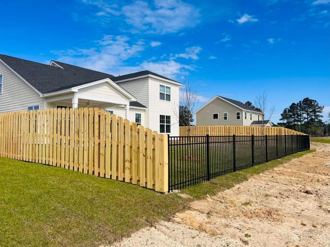 Wood shadowbox and aluminum fence installed in Lenox at Buckhead East